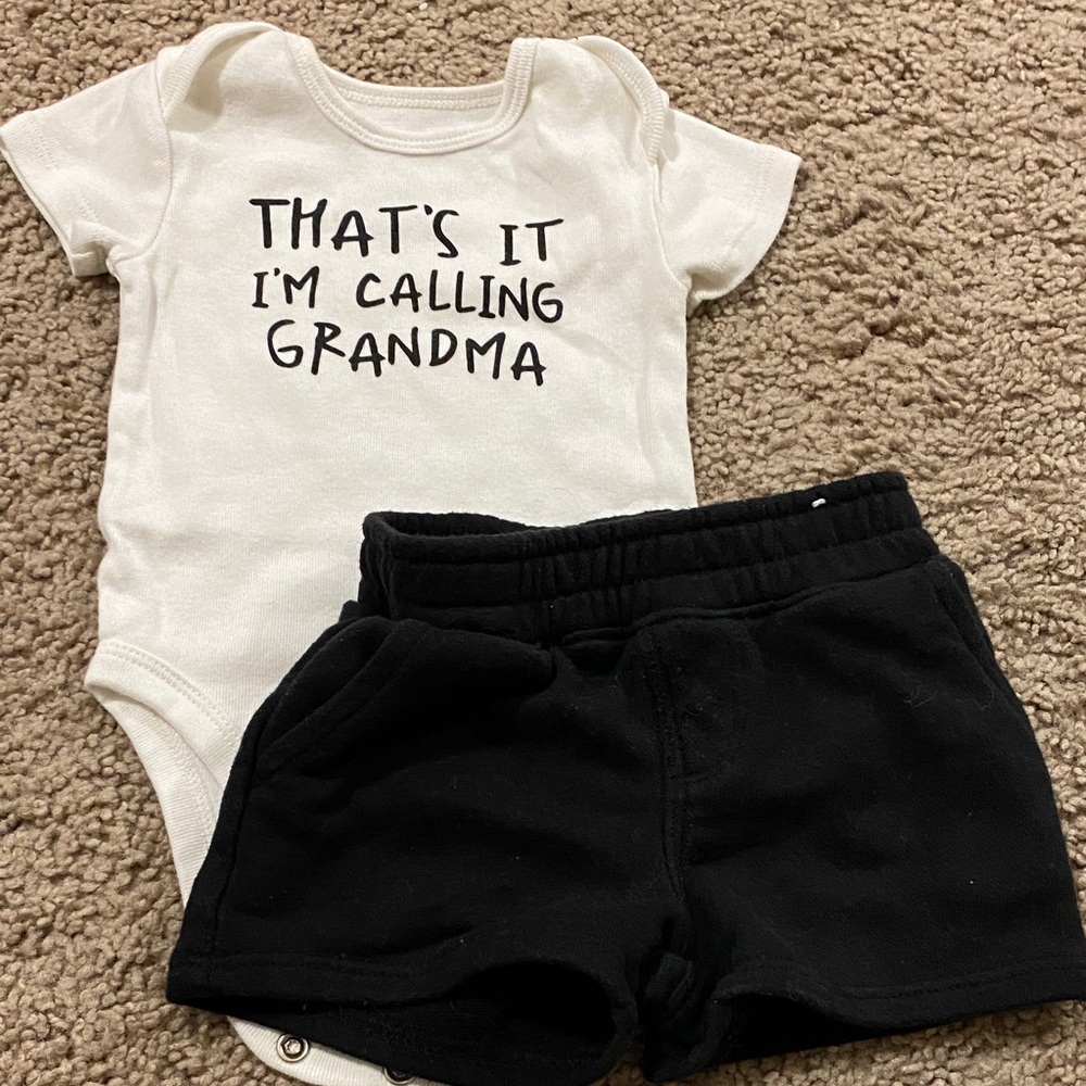 White Baby Onesie and Black Shorts Set